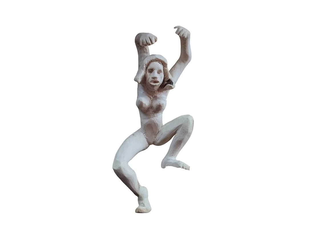 Dancing hand-carved wooden figure by Ilias Toliadis