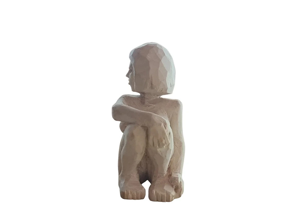 Waiting seated hand-carved wooden figure by Ilias Toliadis