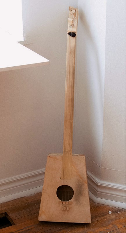instrument made from collected wood from the street